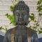 Große Buddha-Figur in Bronzeoptik, sitzend, 38 cm