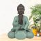 Sitzende Buddha-Figur mit grünem Gewand, 20 cm