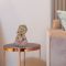 Sitzende Buddha-Figur in nachdenklicher Haltung, 12,5 cm